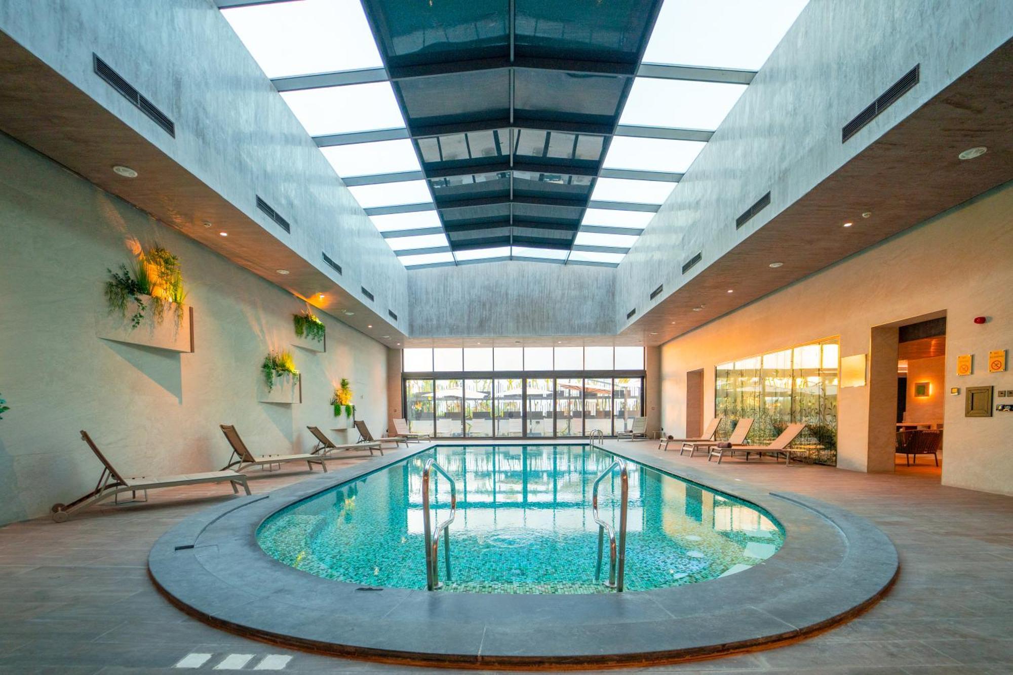 Moevenpick Hotel Du Lac תוניס מראה חיצוני תמונה The swimming pool at the hotel